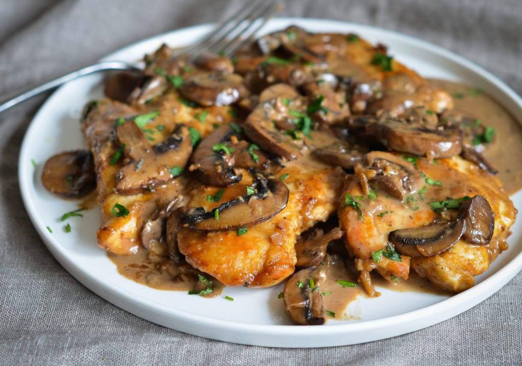 Chicken Marsala · Chicken tenders, ham and mushrooms sauteed in olive oil and Marsala wine.