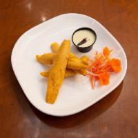 Plantain - Bhajji · Fried fritters made of chickpea-battered with stuffed with plantain.