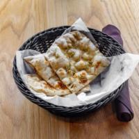 Rosemary Naan · Unleavened white bread baked with dried rosemary leaves