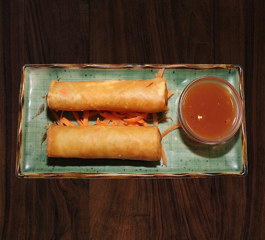 Egg Roll · 2 egg rolls stuffed with bean thread noodles, carrots, cabbage, potatoes, celery, and onions. Served with our house sweet and sour sauce.