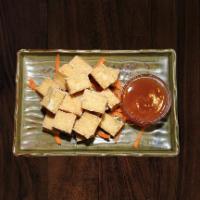 Fried Tofu · Extra film tofu, deep fried until golden brown. Served with sweet chili sauce.
