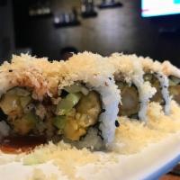 Crunch Roll · In: Shrimp tempura, cucumber and avocado. Top: Crunch. Sauce: Eel sauce.