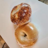 Bagel with Cream Cheese · Your choice of a plain or asiago cheese bagel with plain cream cheese.