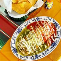 Burrito Norteno · Wet burrito half green half red with sour cream. Your choice of meat chicken or Asada. (Spicy)