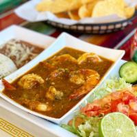 Camarones a la Diabla · Sauteed shrimp in family recipe chile sauce. Extremely spicy. Served with rice and beans and...