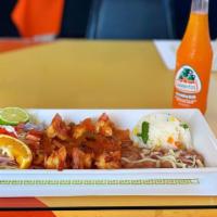 Camarones Rancheros · Grilled shrimp covered in signature rancheros sauce. Served with rice and beans and a fresh ...