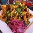 Calamares · Golden-fried calamari topped with chorizo, pickled onions, shaved jalapenos, grilled lime, a...