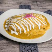 Burrito Texano · Flour tortilla filled with fajita meat choice of beef or chicken, refried beans, rice, Monte...