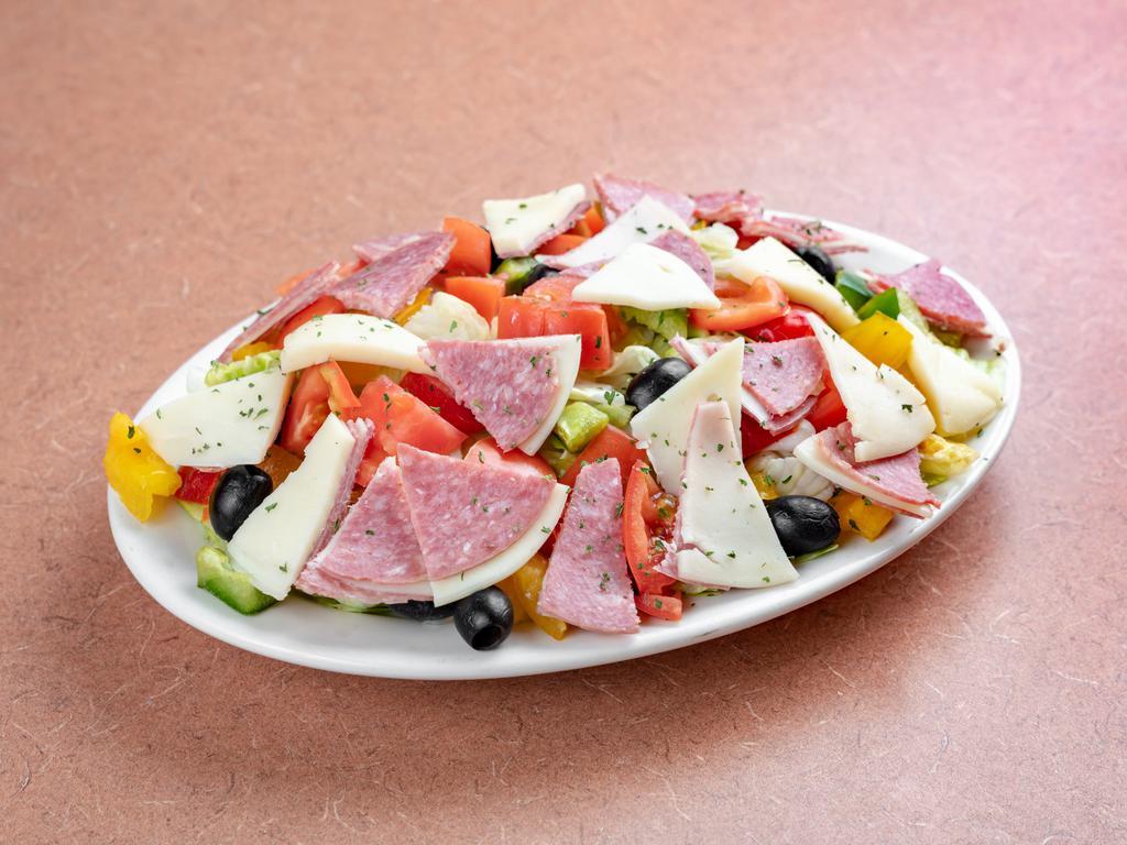 Antipasto Salad · Chopped cured meats, fresh cheeses, and briny olives.