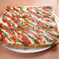 Pesto  Specialty Pizza · Made with pesto, classic cheese, and tomato sauce.