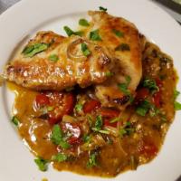 Pork Chop · Bone-in. Pan-seared with hot cherry peppers, white wine sauce.