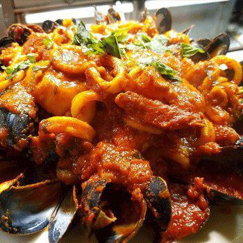 Seafood Fra Diavolo · Over linguine. Shrimp, scallops, calamari and mussels in a plum tomato sauce (sweet, medium or hot).