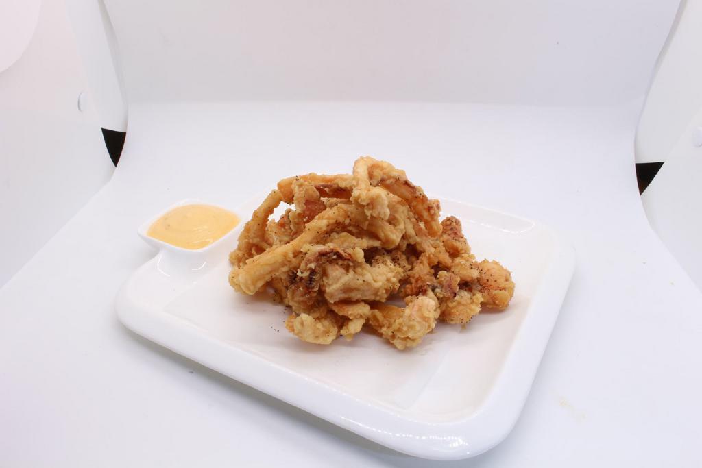 Fried Calamari · Served with spicy mayo sauce.