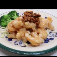 Honey Walnut Shrimp · Lightly battered shrimp, coated with a flavorful mayonnaise sauce, milk, honey, sugar, toppe...