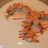 Scorpion Roll · 2 rolls. Temp. shrimp, soft shell crab, avocado, ebi, spicy and eel sauce, sesame seeds.
