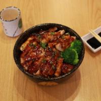 Teriyaki Chicken Donburi  · Grilled strips of marinated chicken, coated in teriyaki sauce arrange over a bowl of rice, g...