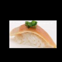 Albacore Tuna Nigiri · Sushi laid top of rice.