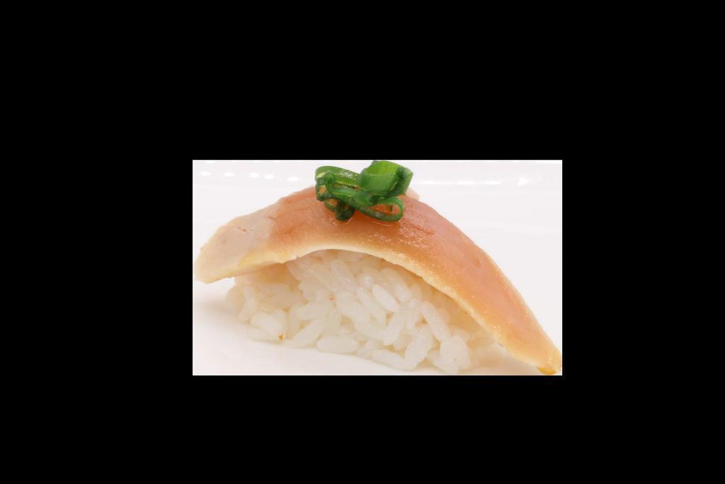 Albacore Tuna Nigiri · Sushi laid top of rice.