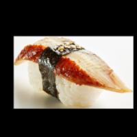 Eel Nigiri · Sushi laid top of rice.