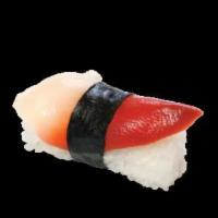 Surf Clam Nigiri · Sushi laid top of rice.