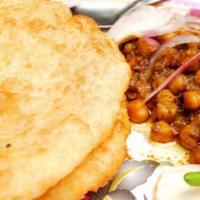 2. Chole Bhature · Chick peas, fried leavened flat bread and spices.