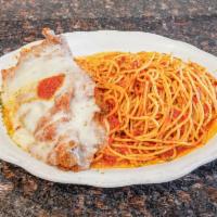 Chicken Parmigiana · Breaded breast of chicken baked with mozzarella and marinara sauce. Served with your choice ...