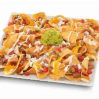 Chicken Super Nachos · Charbroiled chicken with cheese and pico de gallo.