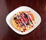 Very Berry Waffle · Fresh blueberries, strawberries, blackberries and raspberries topped with powdered sugar.