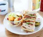 Turkey Bacon Club Sandwich · Triple decker! House roasted turkey breast, crisp applewood smoked bacon, lettuce, tomato, a...