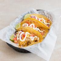 Loaded Tacos · 3 soft corn tortillas stuffed with chicken, green sauce, Monterrey jack and cheddar cheese a...
