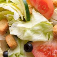 Garden Salad · Hand-leafed lettuce topped with diced tomatoes, black olives and cucumbers.