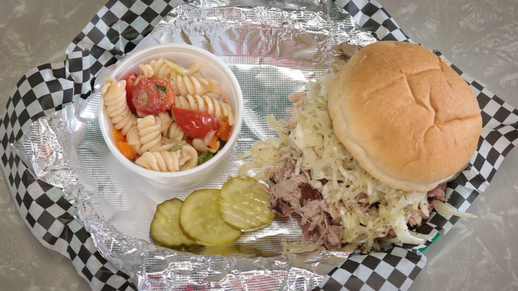  Carolina Pulled Pork Sandwich · Delicious smoked pulled pork topped with our vinegar slaw
