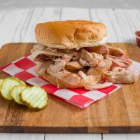  Smoked Chicken Sandwich · Our smoked chicken hand pulled off the bone and put on a sandwich