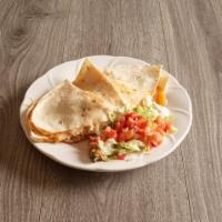 Quesadilla · Large flour tortilla filled with cheddar cheese, tomatoes, onions, guacamole and sour cream,...