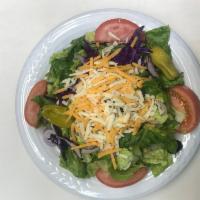 Tossed Salad · Crisp lettuce, tomatoes, red onions, red cabbage, pepperoncini, black olives, mozzarella and...