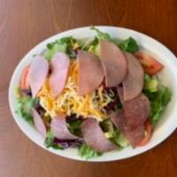 Antipasto Salad · Crisp lettuce, tomatoes, red onions, red cabbage, pepperoncini, black olives, mozzarella, ch...