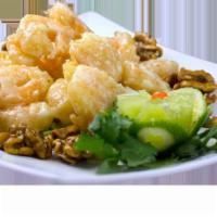 44. Honey Walnut Jumbo Shrimp · Crispy battered jumbo shrimp tossed in creamy mayonnaise sauce served with honey walnut and ...