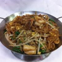 78. Chow Kueh Teow  · Malaysian style, stir-fried flat rice noodle with chivas, bean sprouts, and egg in spicy soy...