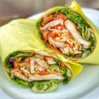 Grilled Chicken Wrap · Includes mixed greens, diced tomatoes, shredded cheese, choice of dressing.