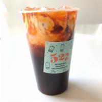 Thai Iced Tea 泰式冰茶 · A Thai classic combining spiced black tea and sweetened evaporated milk. Try it with boba fo...