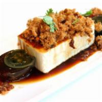 Preserved Egg with Pork Sung and Tofu 皮蛋肉鬆豆腐 · Silky tofu topped with pork floss, paired with a preserved egg.
