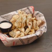 Famous Fried Pickles Dinner · Pickled In-house, Sliced Thin and Serve with a Side of White BBQ sauce.