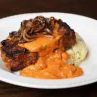 Meatloaf Plate · Housemade Meatloaf Seared on the Grill, Topped with Caramelized Onions and Tomato Gravy.  Se...