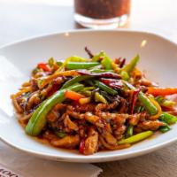 Shredded Pork with Green Peppers · Sauteed with bamboo shoots and wood ear in szechuan garlic sauce. Hot and spicy.