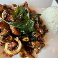 Gaprao Calamari *** New *** · Famous street spicy dish with deep-fried calamari squid stir fried with garlic, mushrooms, a...