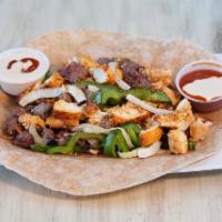 11. Super Protein Wrap · Chicken and lean bison with onions and peppers cooked with mildly spicy FUEL sauce. 