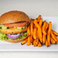 95. Salmon Burger Combo · Wild Alaskan salmon burger with herbs and spices. With baked air fries and choice of drink.