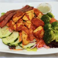 101. Chicken Chipotle Salad · Chicken, mixed greens, broccoli, shredded carrots and turkey bacon with Parmesan cheese topp...