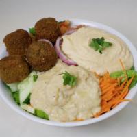 102. Mediterranean Salad · Mixed greens, bed of romaine lettuce, a scoop of hummus, baba ghanouj and two baked falafels...