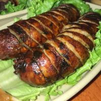 Lao Sausages (2) · Ground pork, minced yellow onions, green onion, cilantro, lemongrass and bay leaves filling....